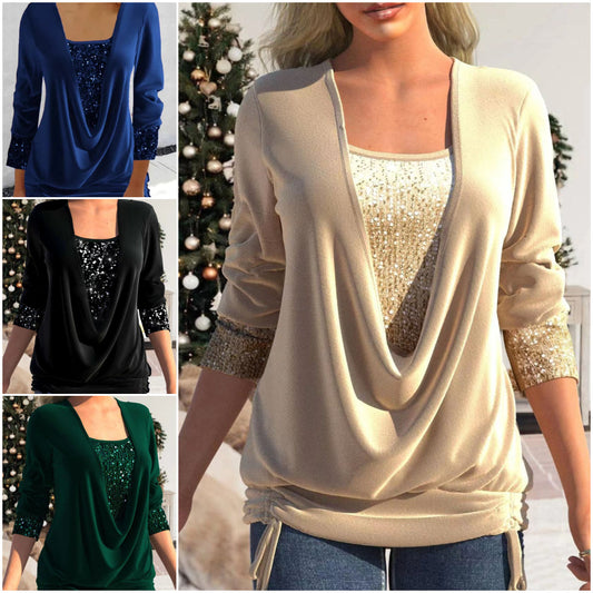 Kétrészes flitteres felső, bő, megkötve.