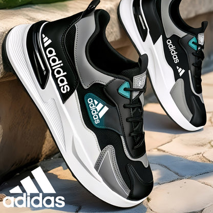 Lélegző hálós anyagból készült, fűzős Adidas sportcipő, minden évszakra alkalmas.