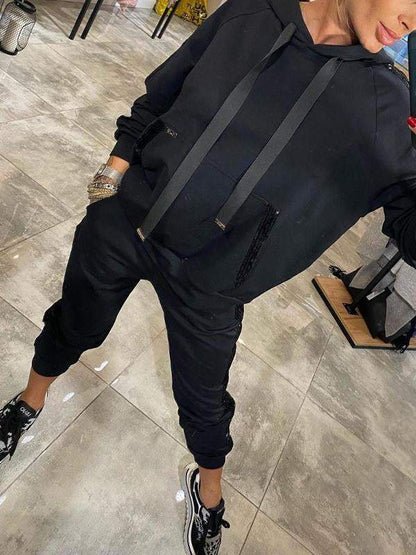 Női hosszú flitteres alkalmi öltöny kapucnival