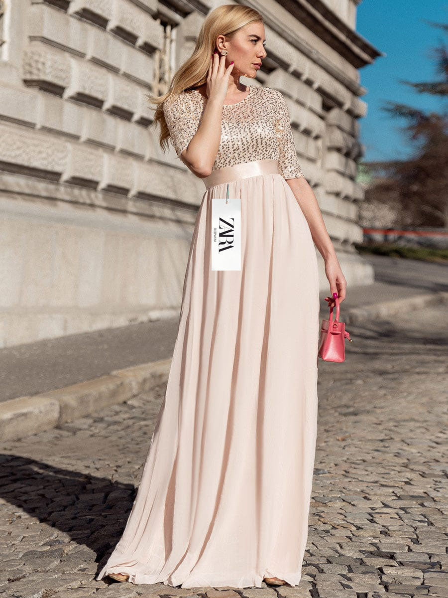 Elegáns, flitteres ruha hosszú ujjal és kerek nyakkivágással