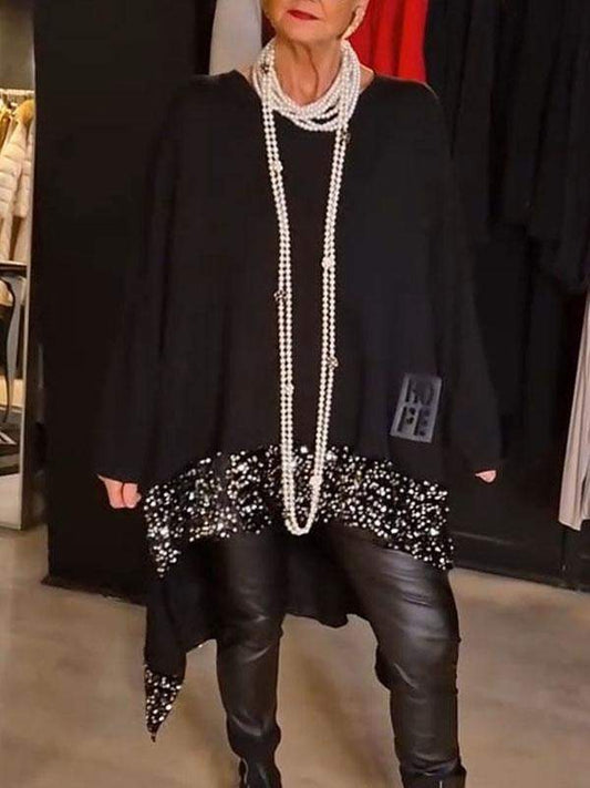 Női felső flitterekkel és kerek nyakkivágással