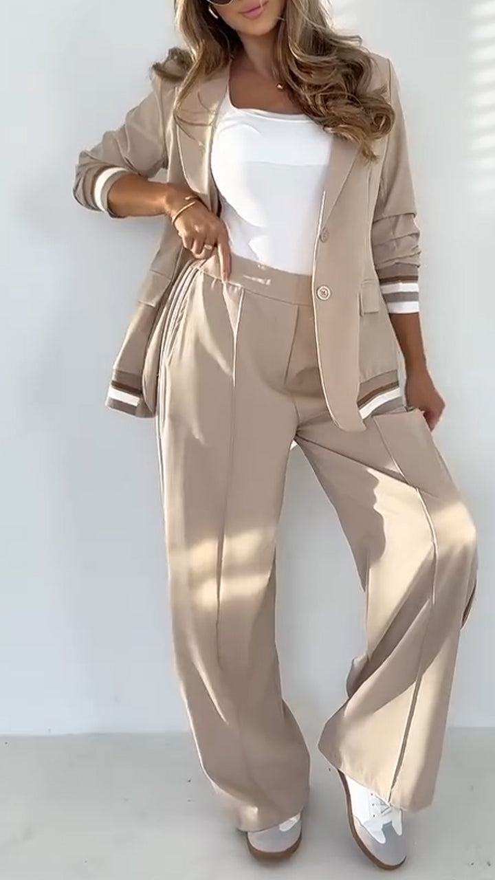 Női hajtóka egyszínű, csíkos alkalmi öltöny