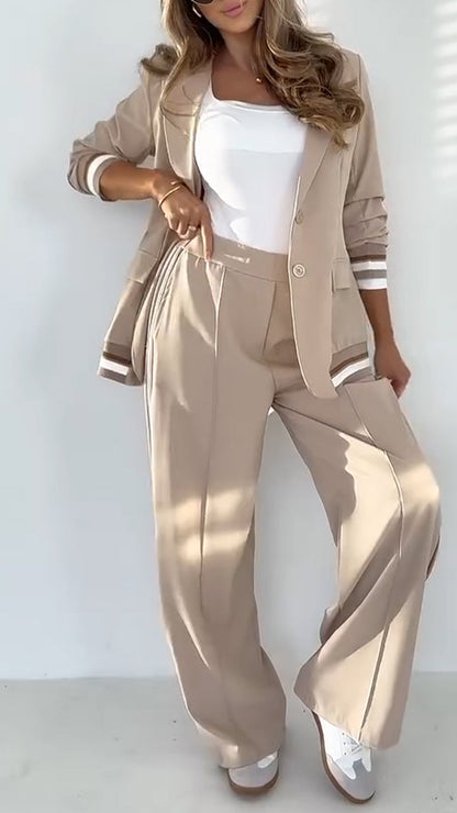 Női hajtóka egyszínű, csíkos alkalmi öltöny