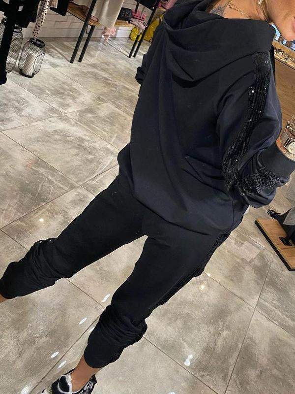 Női hosszú flitteres alkalmi öltöny kapucnival